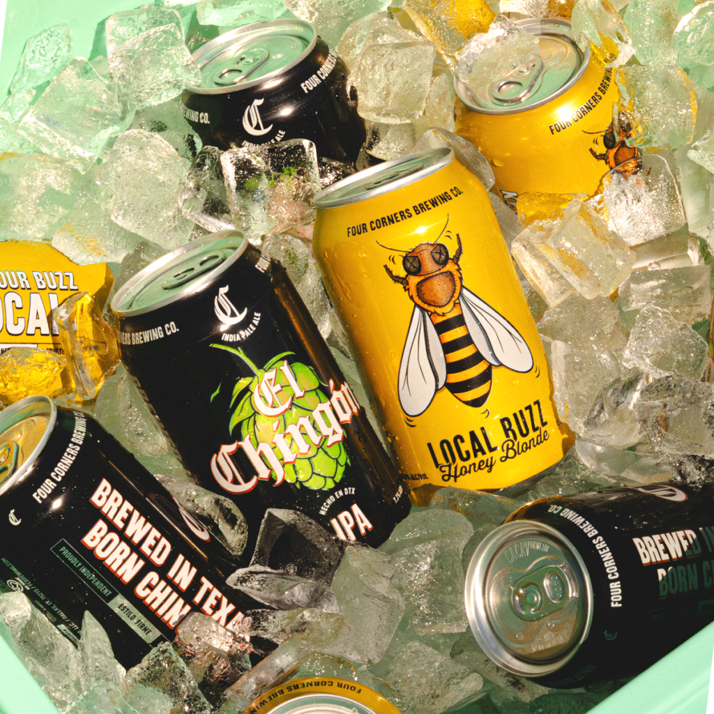 Four Corners Brewing Co. El Chingón IPA and Local Buzz Honey Blonde cans scattered on ice with Brewed in Texas Born Chingón tagline visible
